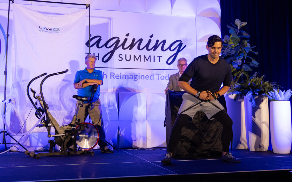 Man demonstrating biohacking for longevity with Exercise with Oxygen Therapy and Sauna with Red Light Therapy.