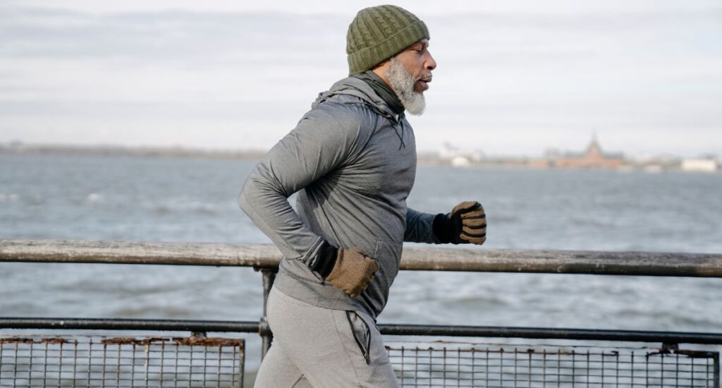 Man exercising by running for cardiovascular health