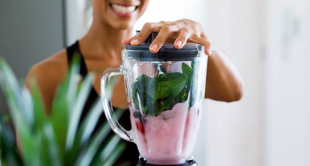 Woman Making a Breakfast Smoothie